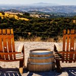 Two chairs at winery overlooking Paso Robles greenery