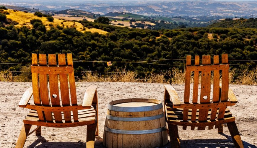 Two chairs at winery overlooking Paso Robles greenery