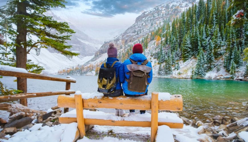 People sitting on a bench in Banff