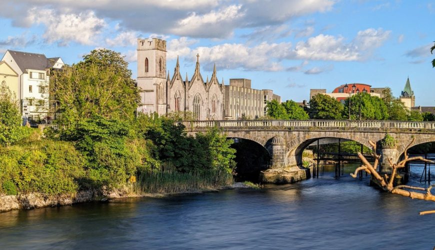 Historic buildings along river in Galway, Ireland