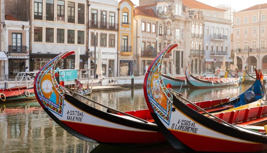 Gondolas In A Canal In Aveiro, Portugal